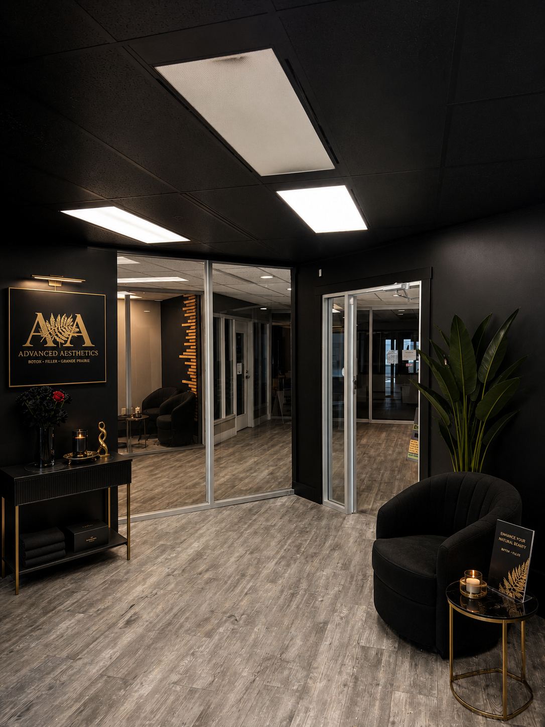 The Advanced Aesthetics reception, black walls with brass and product display