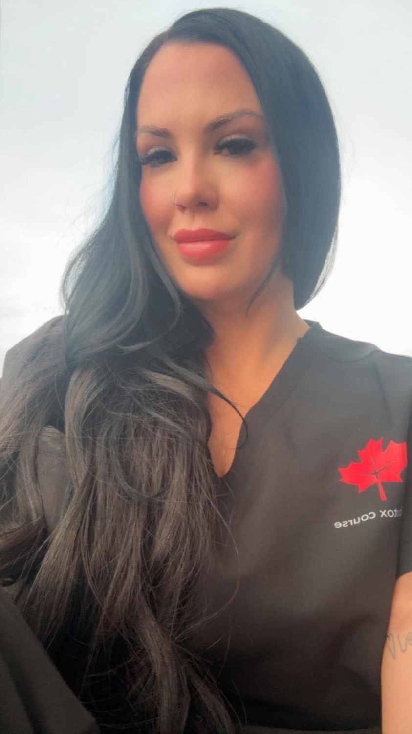 Chelsea Walker in her injector training scrubs